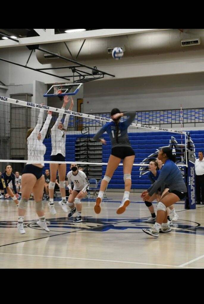 Basic senior outside hitter AnnaMaria Ramos prepares to spike the ball. Photo courtesy of AnnaM ...