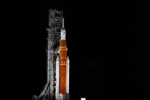 NASA's new moon rocket sits on Launch Pad 39-B hours before liftoff Monday, Aug. 29, 2022, in C ...