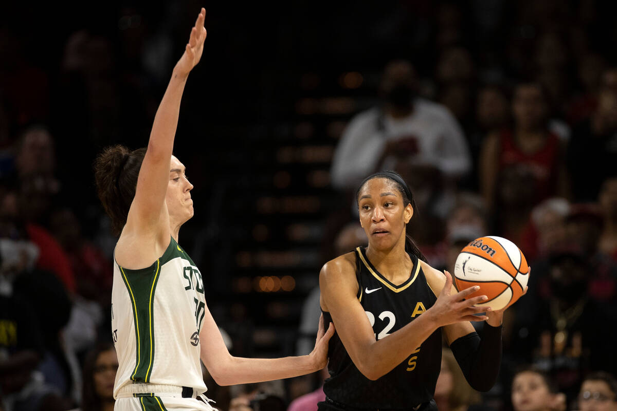 Las Vegas Aces forward A'ja Wilson (22) looks to pass while Seattle Storm forward Breanna Stewa ...