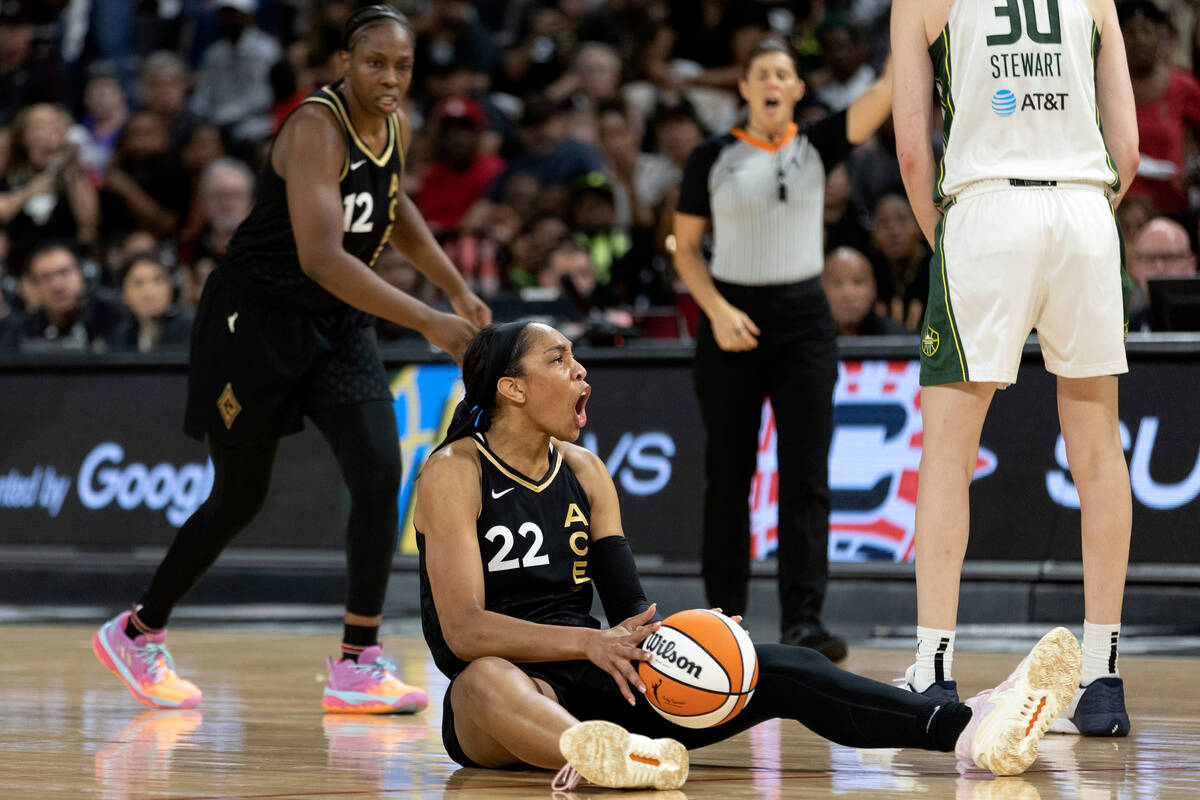 Las Vegas Aces forward A'ja Wilson (22) reacts after a foul is called on Seattle Storm forward ...