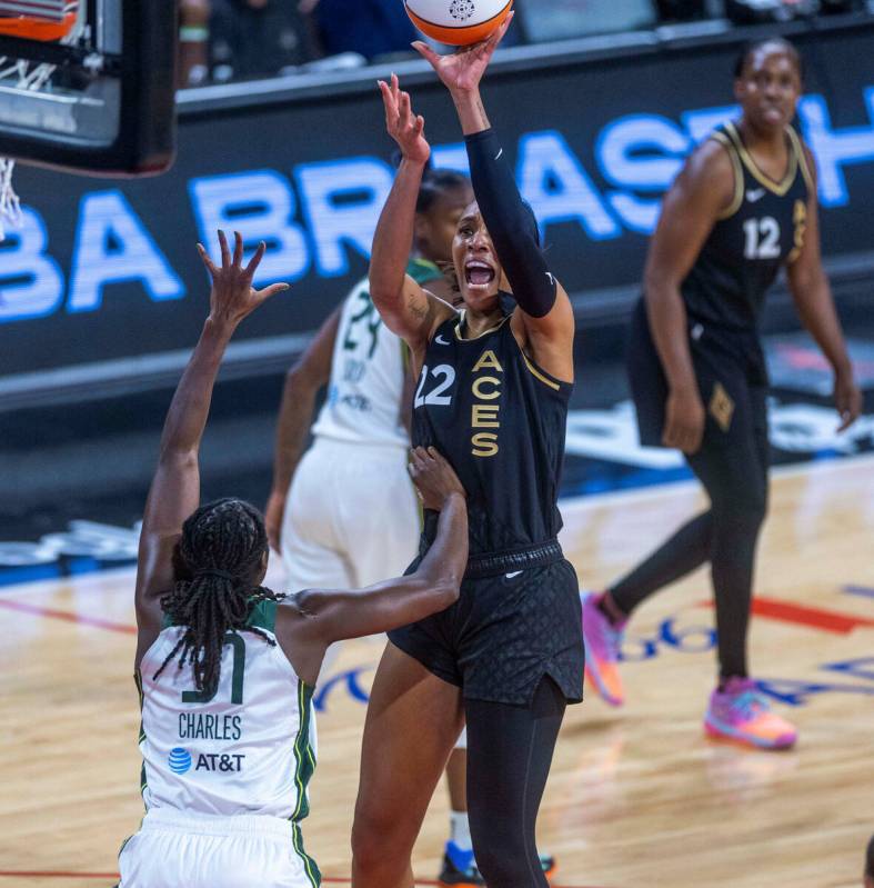Las Vegas Aces forward A'ja Wilson (22) elevates over Seattle Storm center Tina Charles (31) fo ...