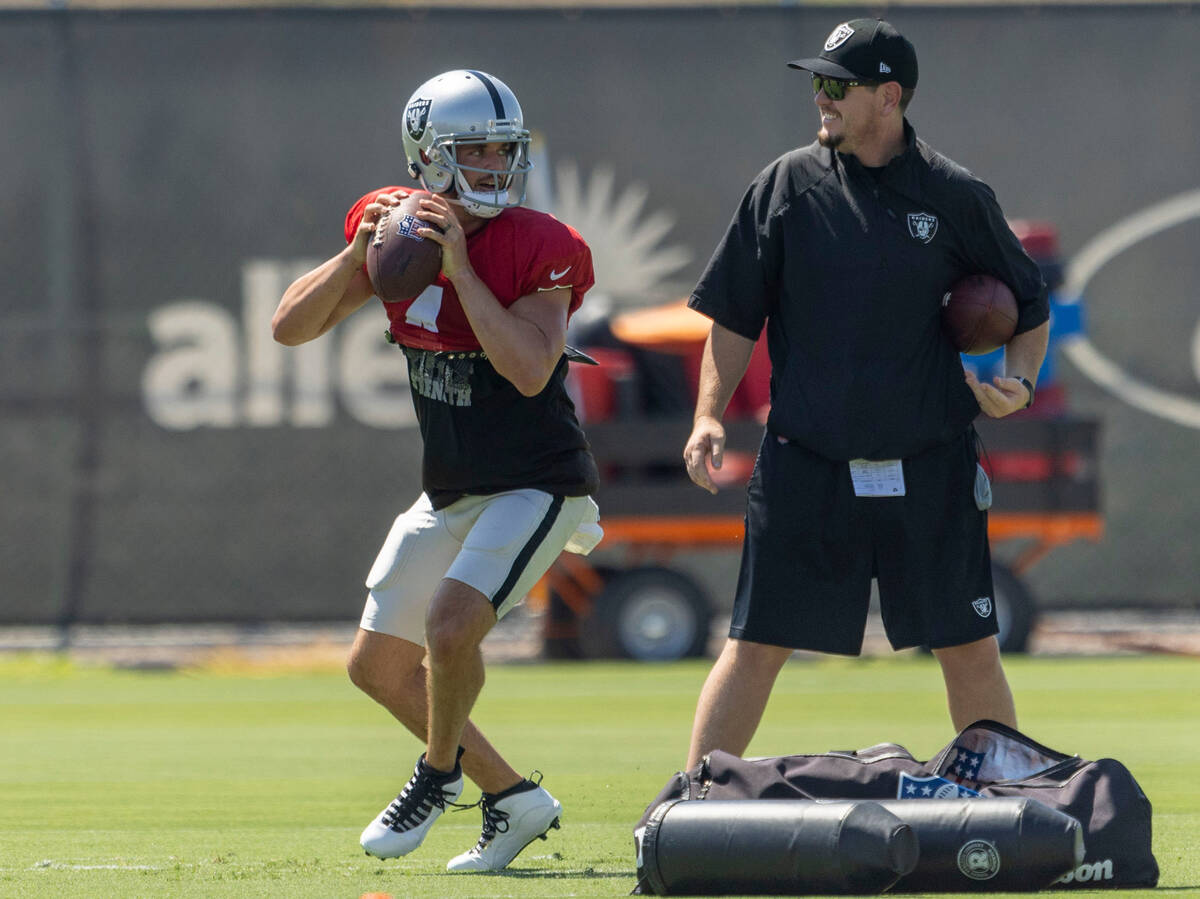 Raiders quarterback Derek Carr (4) makes a throw during practice at the Intermountain Healthcar ...