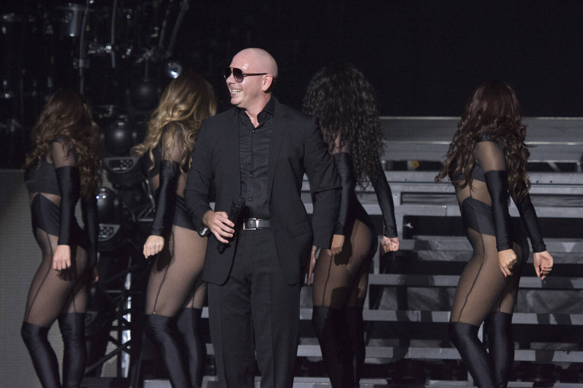 Pitbull performs during the first of a seven-date mini-residency entitled "Time of Our Liv ...