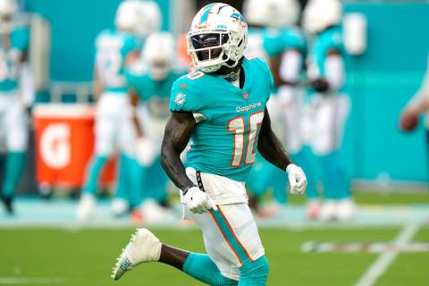 Miami Dolphins wide receiver Tyreek Hill (10) runs before a NFL preseason football game against ...