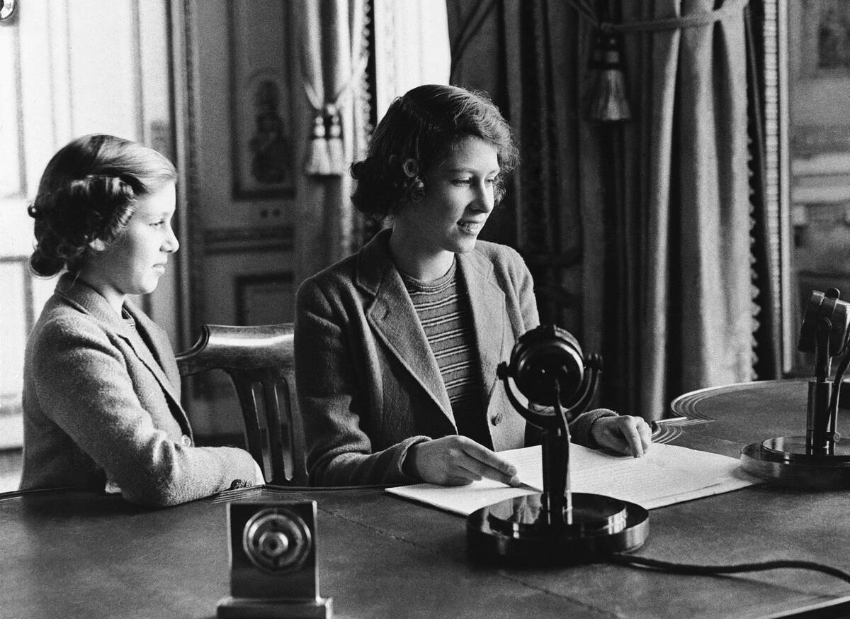 Britain's Princess Elizabeth, right, 14-year-old heiress apparent to the British throne, broadc ...