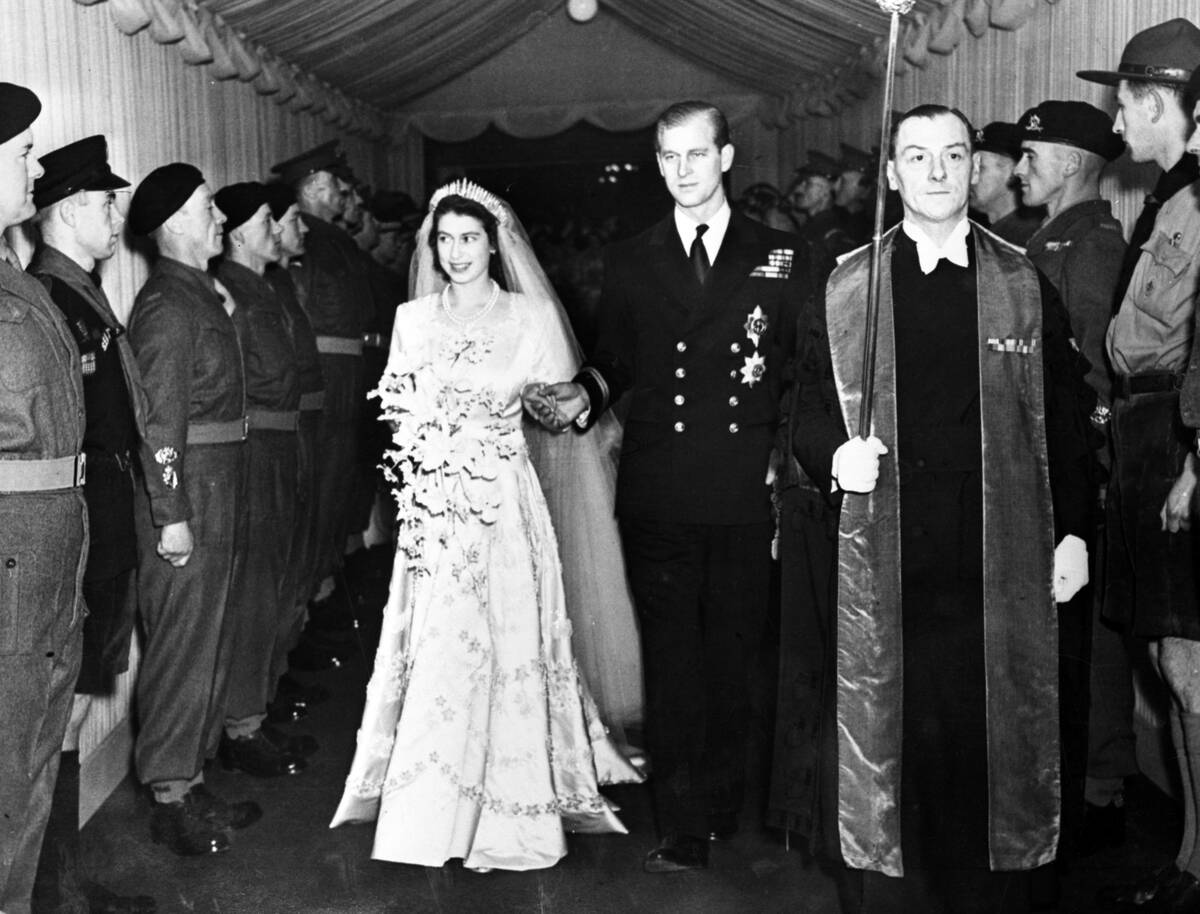Britain's Princess Elizabeth and her husband the Duke of Edinburgh are seen leaving Westminster ...