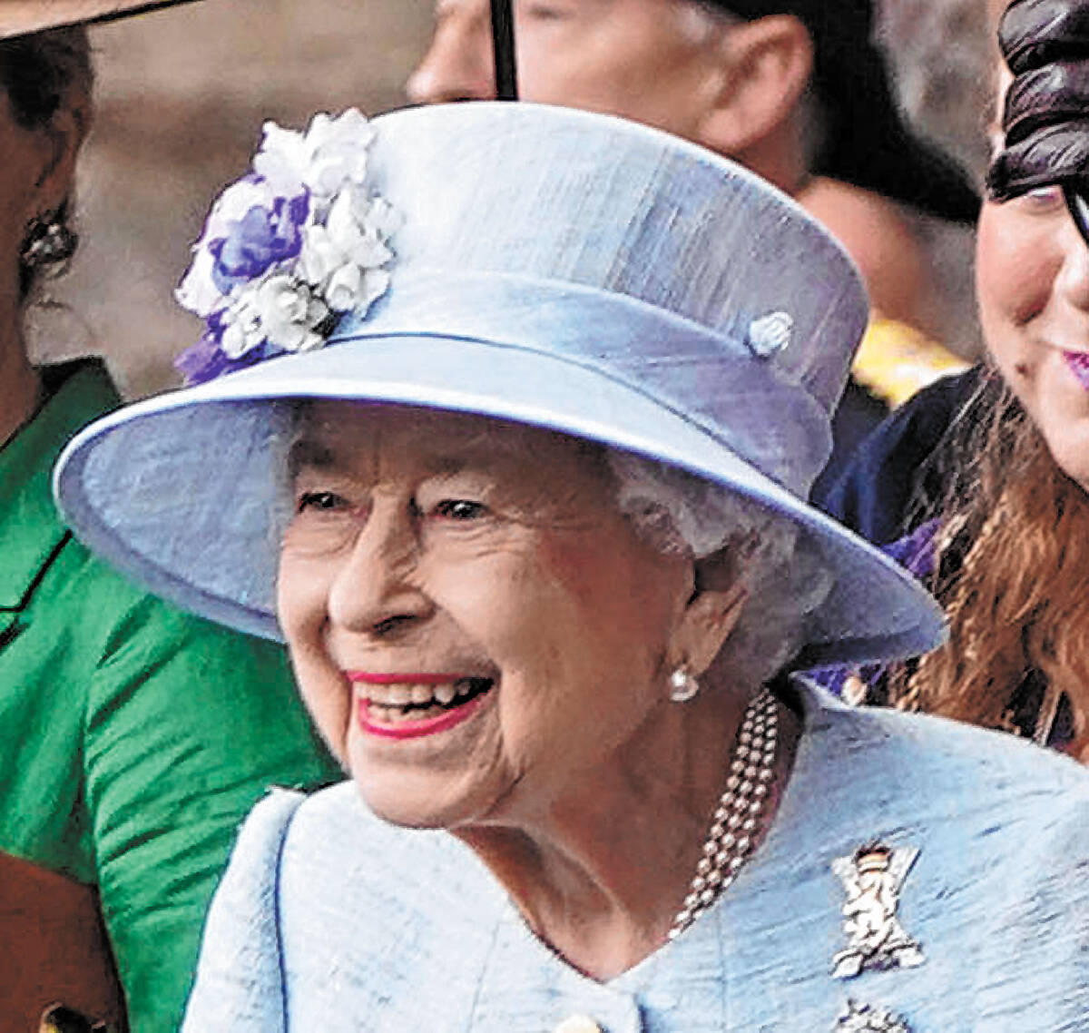 Britain's Queen Elizabeth II is greeted as she attends the Ceremony of the Keys on the forecour ...