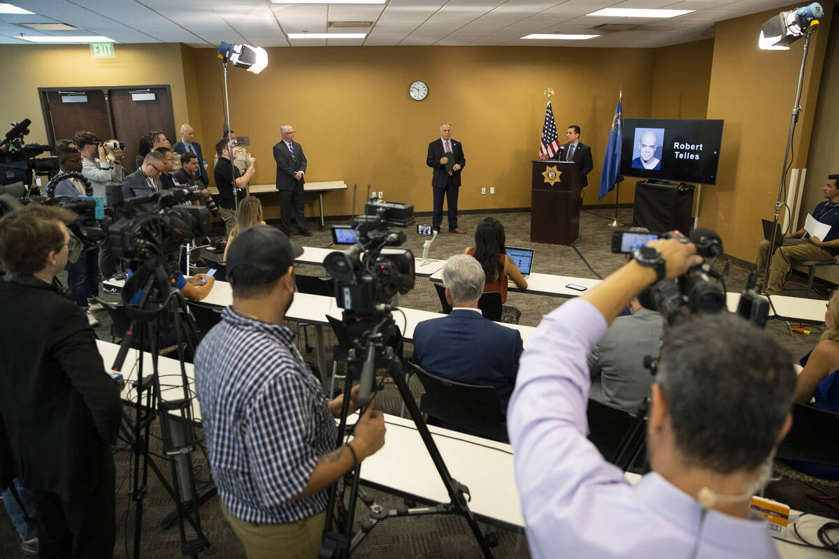 Capt. Dori Koren, right, speaks on the arrest of Robert Telles during a news conference at the ...