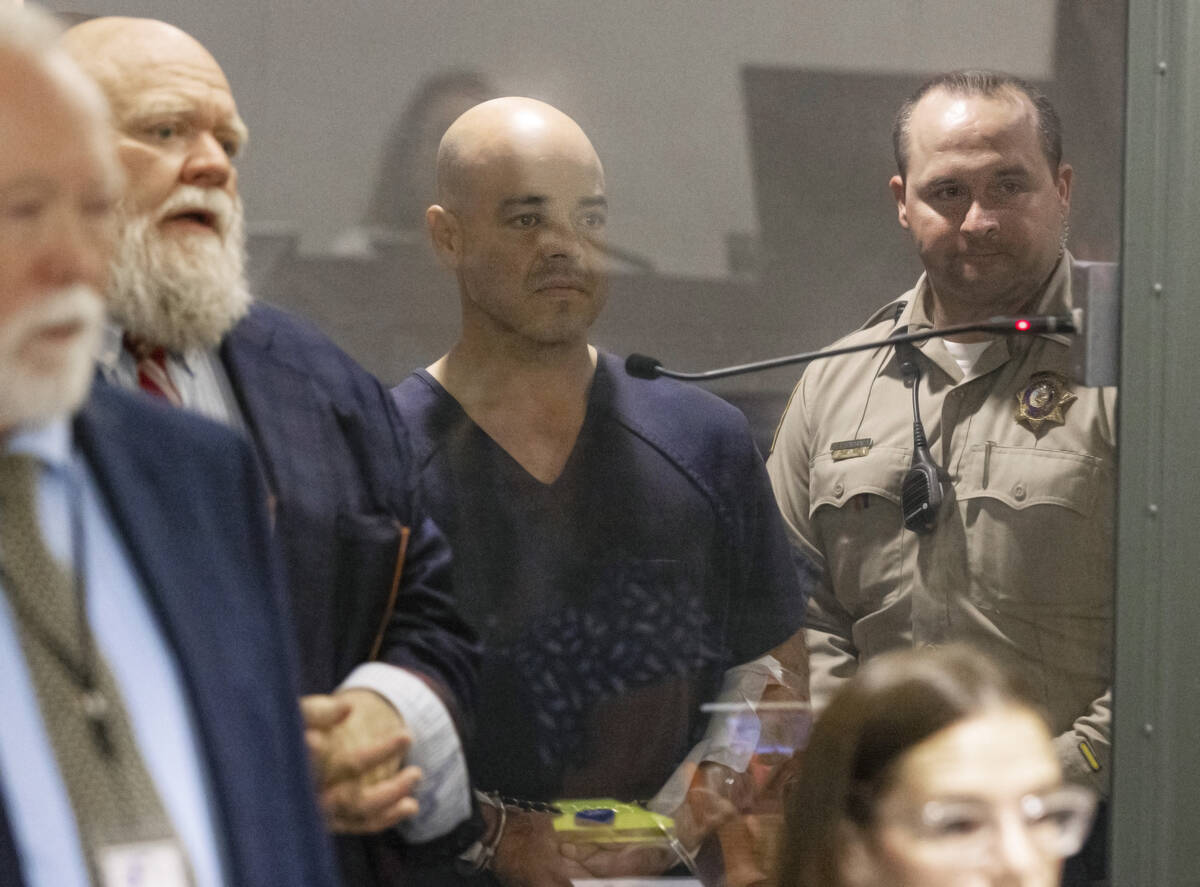 Clark County Public Administrator Robert Telles appears in court with his attorney, Travis Shet ...
