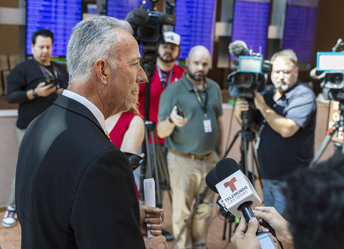 District Attorney Steve Wolfson speaks to the media about Clark County Public Administrator Rob ...