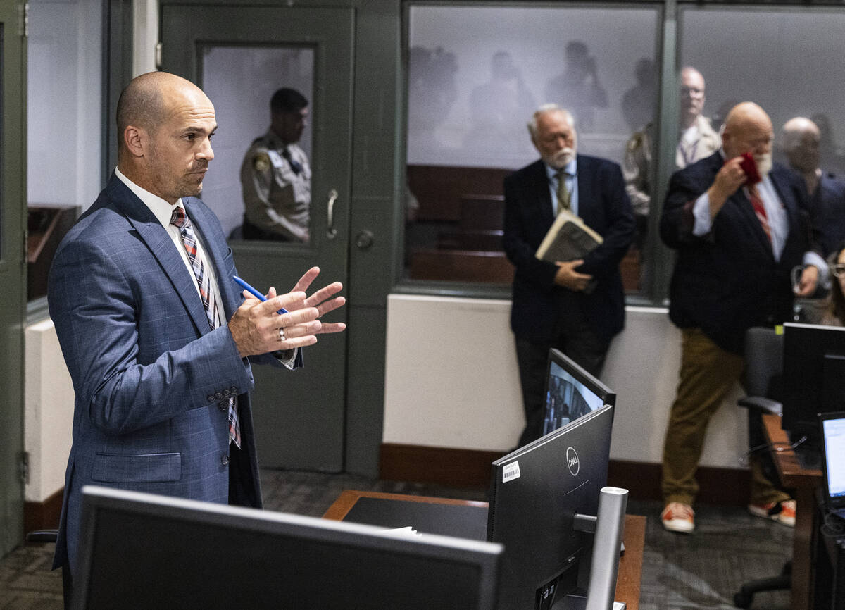 Chief Deputy District Attorney Richard Scow reads Clark County Public Administrator Robert Tell ...
