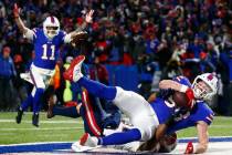 Buffalo Bills tight end Dawson Knox (88) makes a catch for a touchdown during the first half of ...