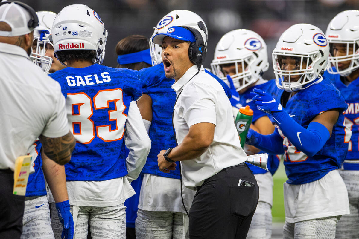 Bishop Gorman head coach Brent Browner gives instructions versus McQueen during the first half ...