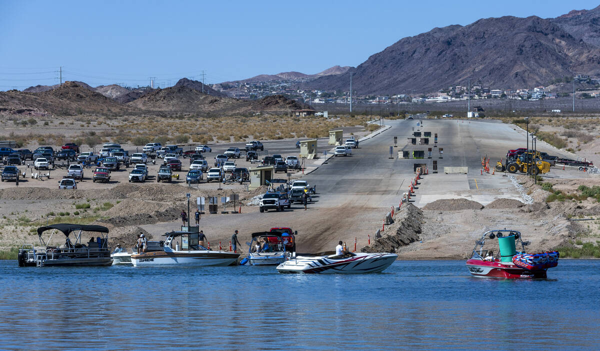 Boats line up to launch and be taken out at Hemenway Harbor with a short wait time on Labor Day ...