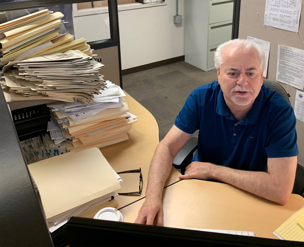 FILE - Jeff German working in the Las Vegas Review-Journal offices in 2018. (Photo by Harrison ...