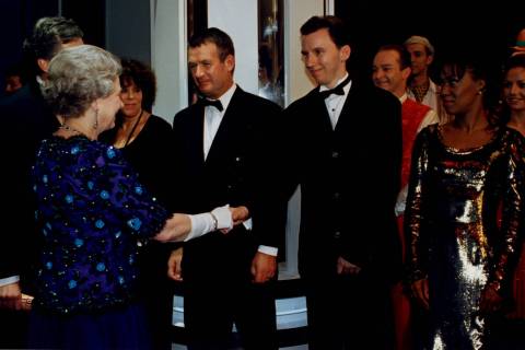 FILE - Andy Walmsley is shown meeting Queen Elizabeth II after the 1995 "Royal Variety Show" in ...