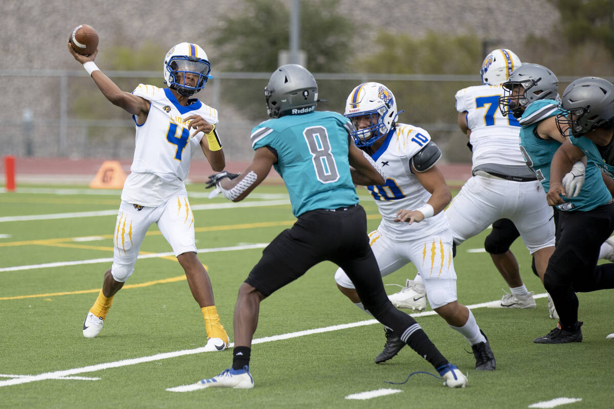 Sierra Vista junior Omari Evans (4) makes a pass against Silverado High School on Friday, Sept. ...