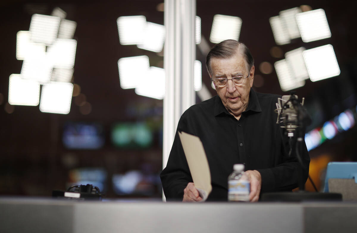 In this Nov. 16, 2017, photo, Brent Musburger looks at notes during a broadcast at the South Po ...