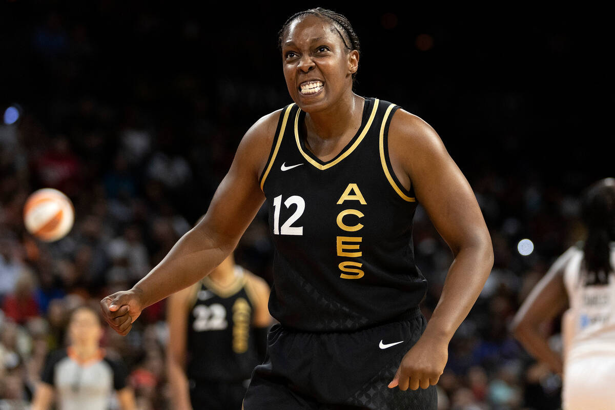 Las Vegas Aces guard Chelsea Gray (12) reacts after an offensive foul is called on the Seattle ...