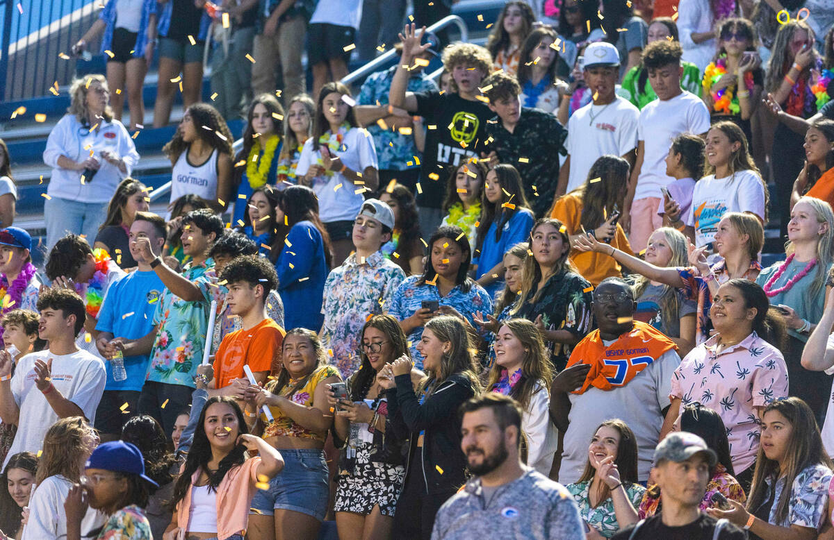Bishop Gorman fans toss confetti as they ready to face Hamilton for the first half of their hig ...
