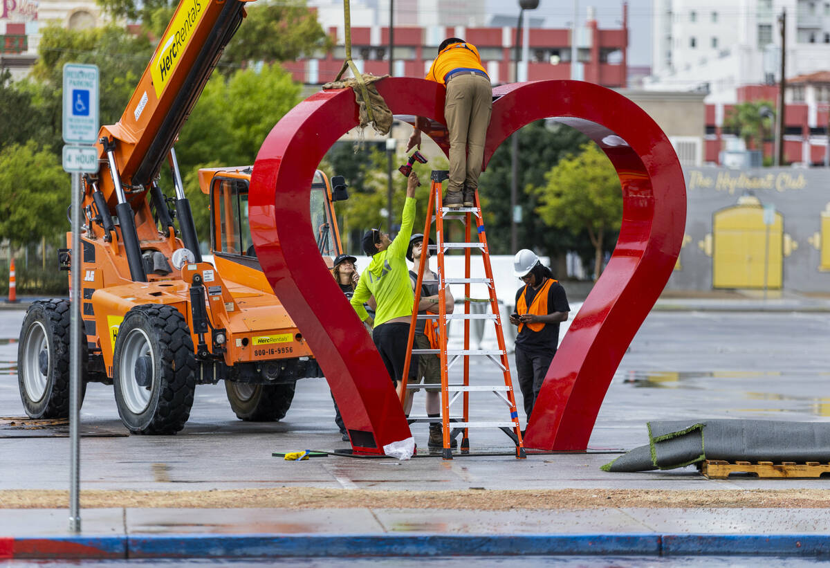 A crew erects a giant heart at the Llama Lot as set up production continues for the upcoming Li ...