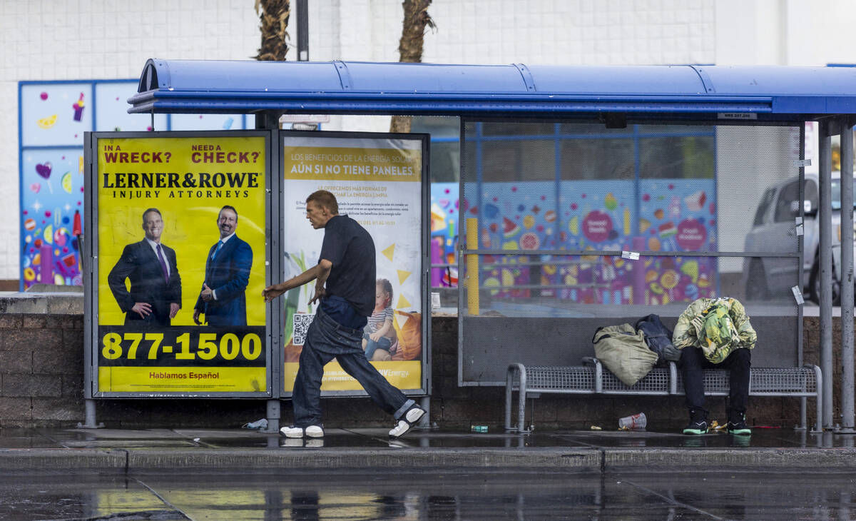 A bus shelter on East Charleston Boulevard offers a break from the rain on Saturday, Sept. 10, ...