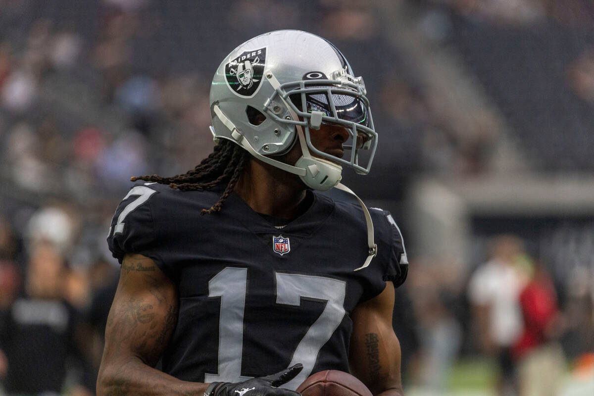 Raiders wide receiver Davante Adams (17) warms up with the team before a preseason NFL game aga ...