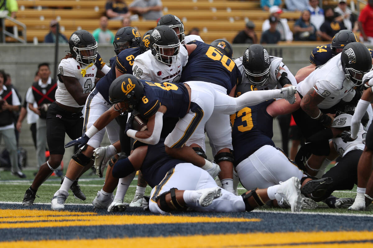 California running back Jaydn Ott (6) runs for a touchdown against UNLV during the first half o ...