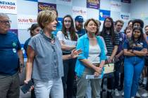 Representative Susie Lee, left, welcomes Senator Amy Klobuchar, working with End Citizens Unite ...