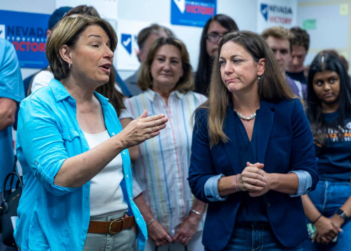 Senator Amy Klobuchar, center, speaks beside Tiffany Muller as President with End Citizens Unit ...