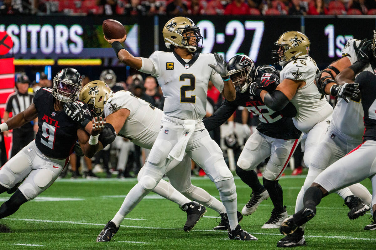 New Orleans Saints quarterback Jameis Winston (2) works during the first half of an NFL footbal ...