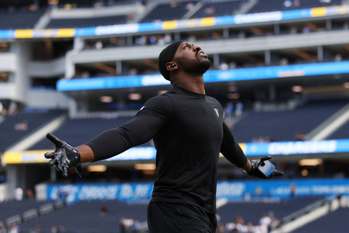 Raiders defensive end Chandler Jones (55) takes the field before the start of an NFL football g ...