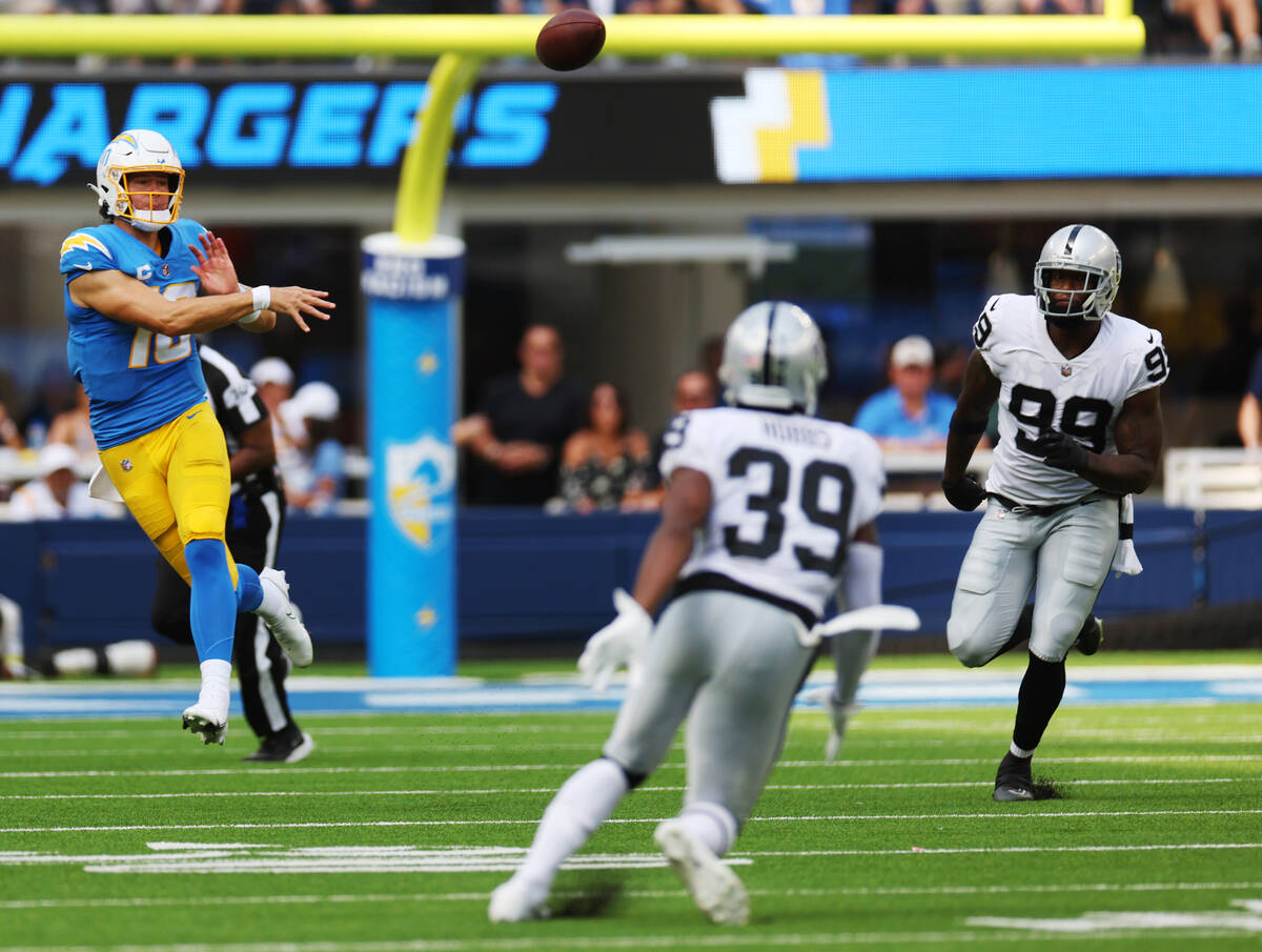 Los Angeles Chargers quarterback Justin Herbert (10) throws a pass during the first half of a N ...