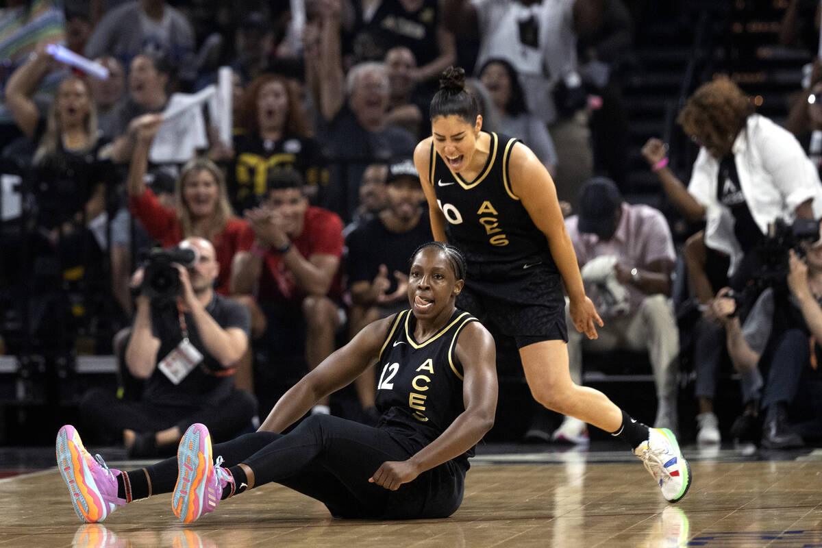 Las Vegas Aces guard Kelsey Plum (10) and guard Chelsea Gray (12) celebrate after Gray scored w ...