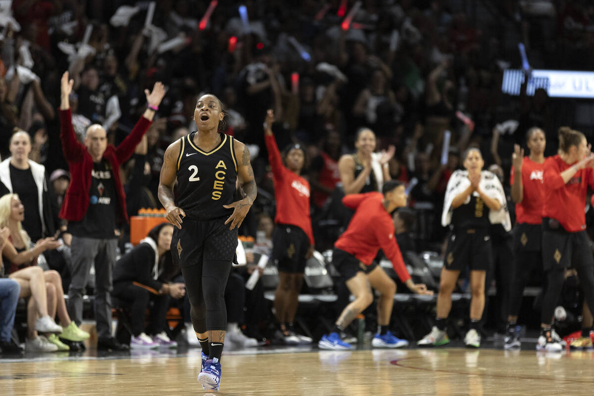 Las Vegas Aces guard Riquna Williams (2) and the crowd behind her celebrate after Williams scor ...