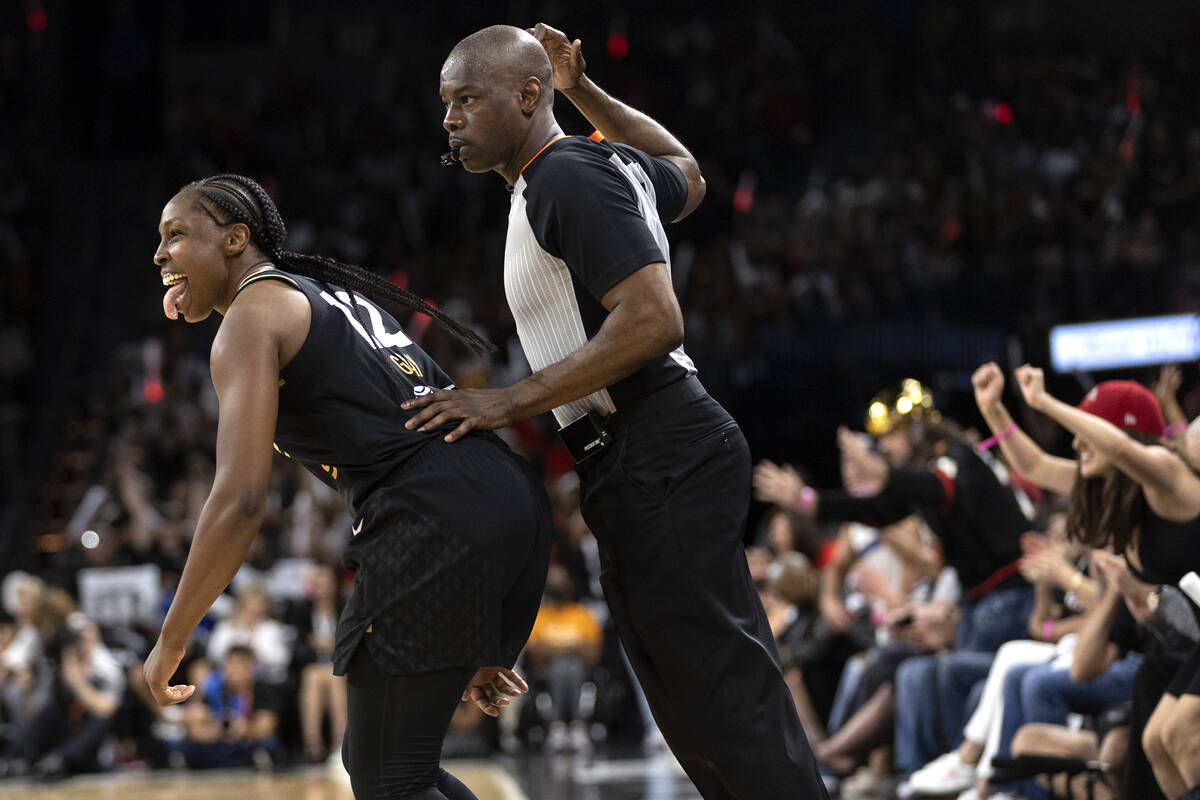 Las Vegas Aces guard Chelsea Gray (12) celebrates after hitting a 3-point shot during the secon ...