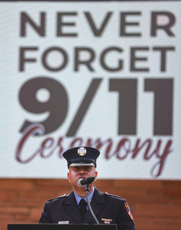 Retired New York City Firefighter Frank Pizarro cries as he reflects on his experience during a ...