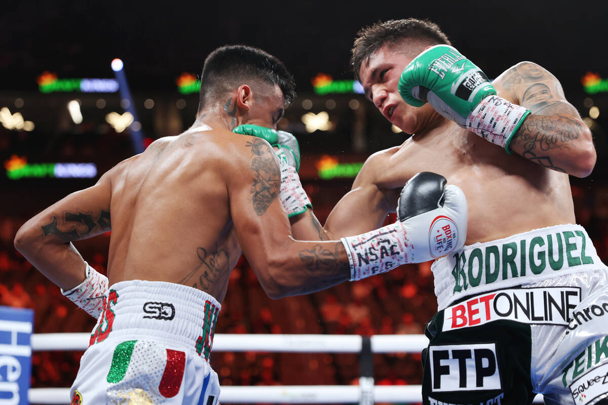 Jesse "Bam" Rodriguez, right, connects a punch against Israel Gonzalez, in the second ...