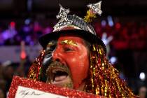 Fan Albert Ronquillo cheers for his team decked out in Las Vegas Aces gear before Game 1 of a W ...