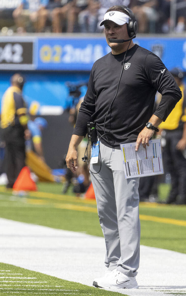 Raiders head coach Josh McDaniels looks on during the second half of an NFL game at SoFi Stadiu ...