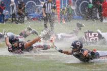 Chicago Bears center Cody Whitehair, left, and quarterback Justin Fields, right, celebrate with ...