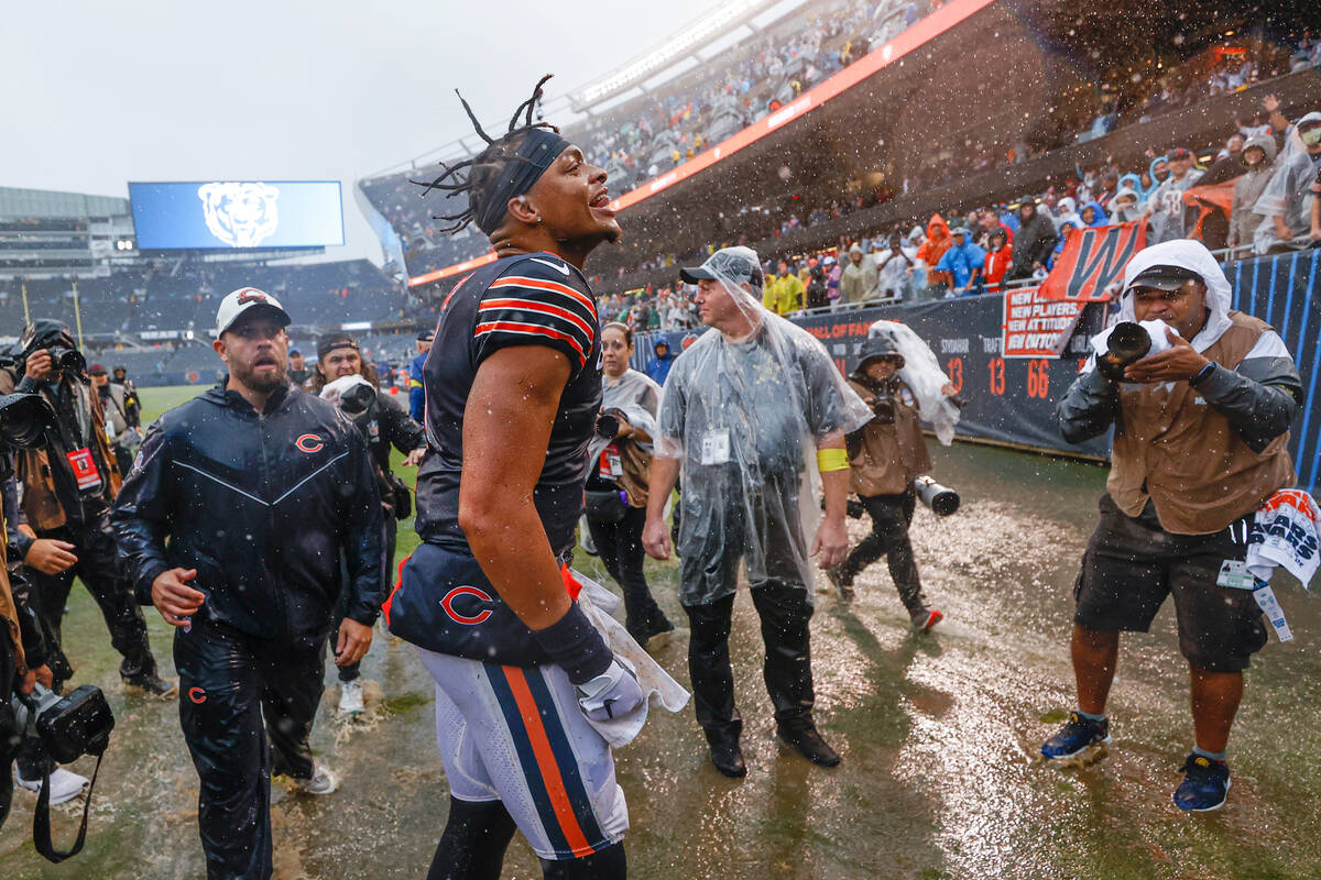 Chicago Bears quarterback Justin Fields celebrates the Bears win against the San Francisco 49er ...