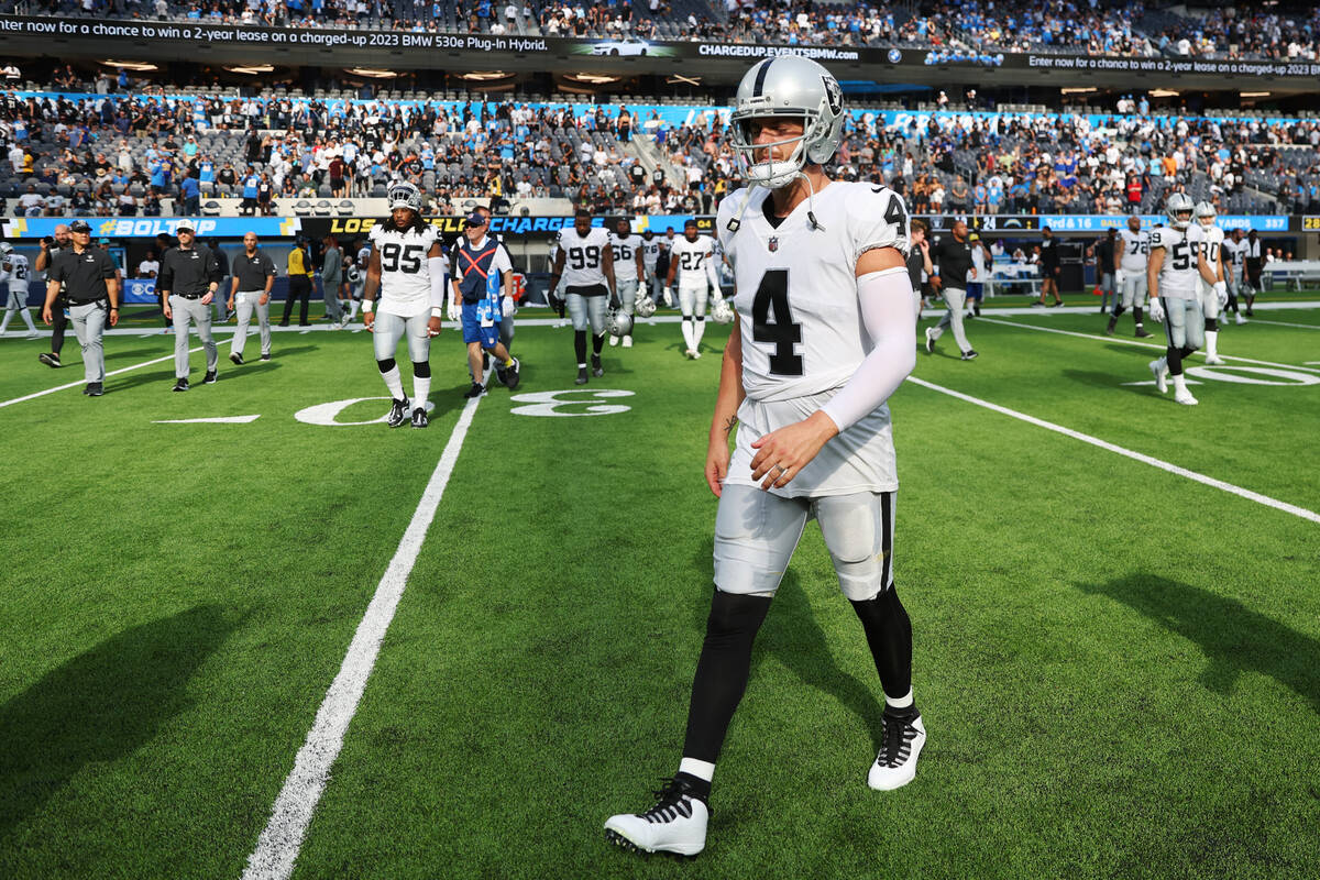 Raiders quarterback Derek Carr (4) takes the field at the end of a NFL football game against th ...