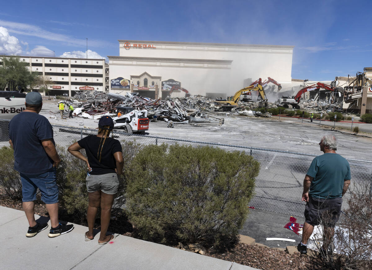 People watch as crews tear down Texas Station, on Monday, Sept. 12, 2022, in North Las Vegas. ( ...