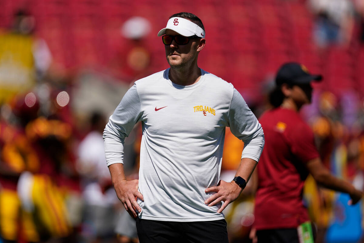 Southern California head coach Lincoln Riley stands on the field before an NCAA college footbal ...