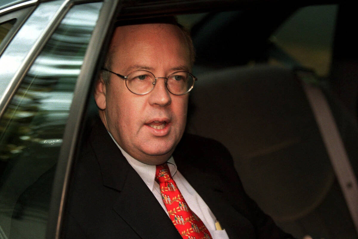 Independent Counsel Kenneth Starr departs his home by car Thursday morning, Sept. 10, 1998, in ...