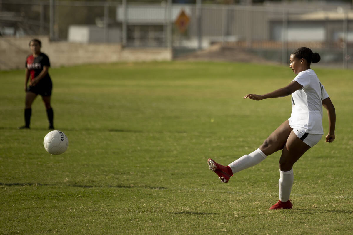 Spring Valley High School’s Macda Angaw (11) makes a pass during their game against Vall ...