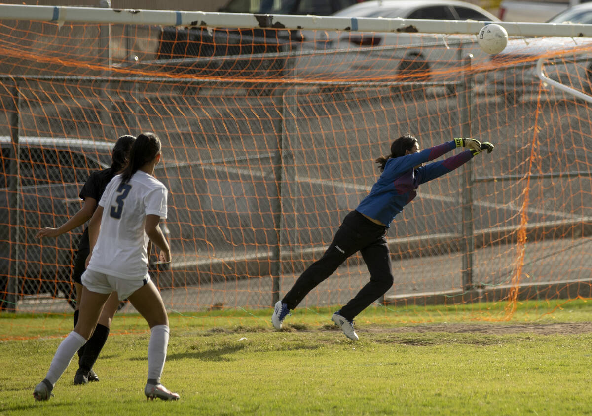 Spring Valley High School’s Tyra Nelson (3) misses a shot during their game against Vall ...