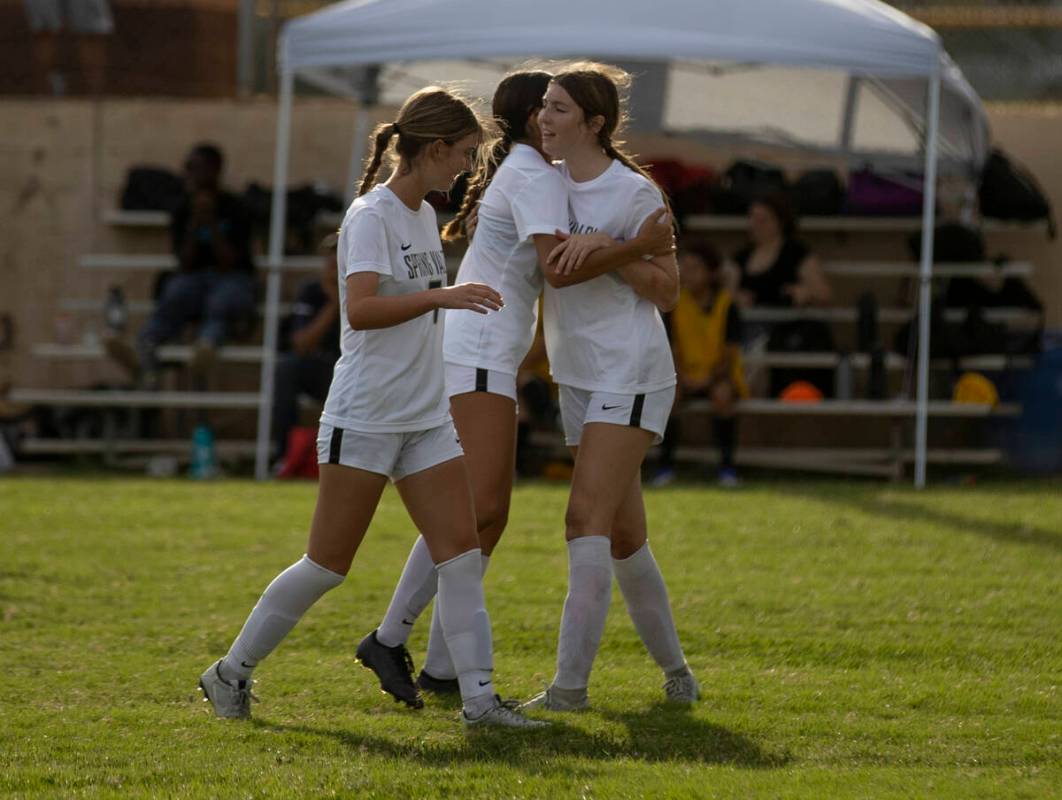 Spring Valley's Darya Morvari (7), Brylie Tavares-Bright (6) and Amaya Hill (15) celebrate a Sp ...