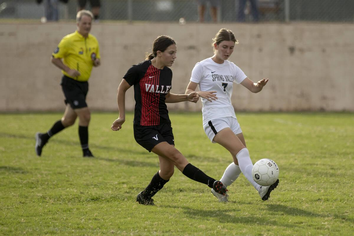 Valley High School’s Quinn Steidler (5) and Spring Valley High School’s Darya Mor ...